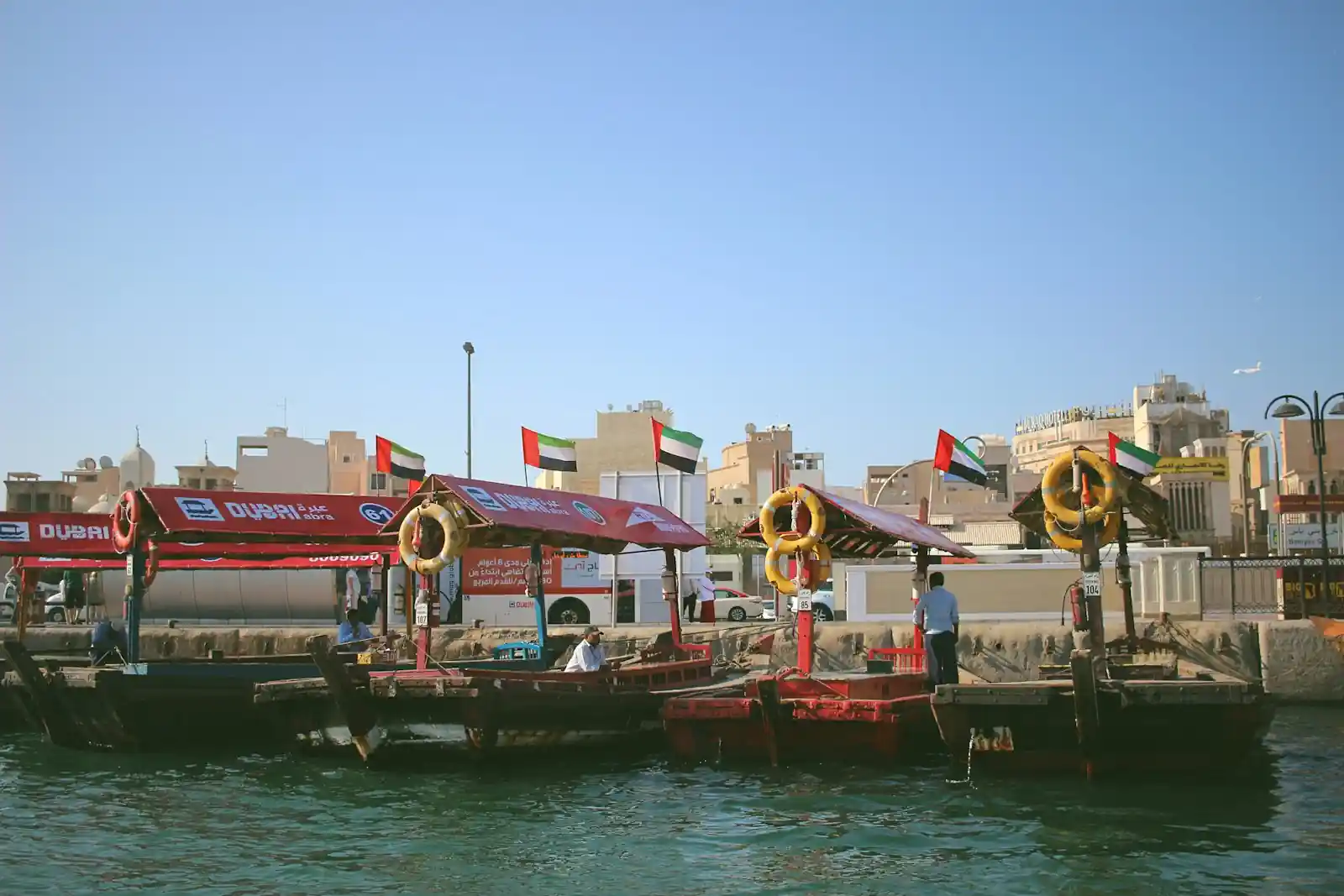Abras and boats moored on Dubai Creek