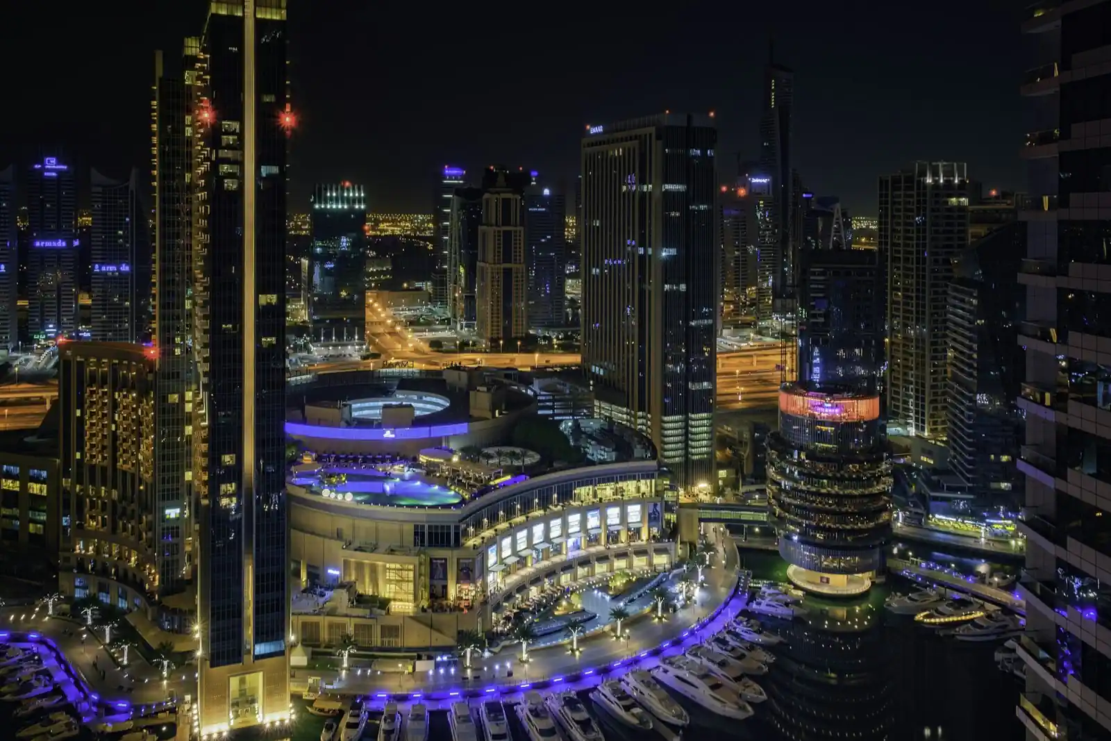 Dubai towers lit up at night