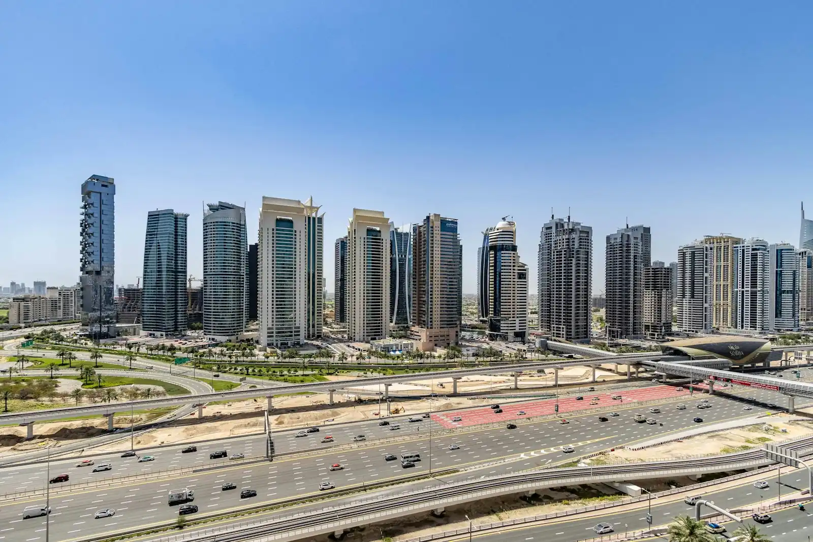 High-rise towers along a Dubai highway
